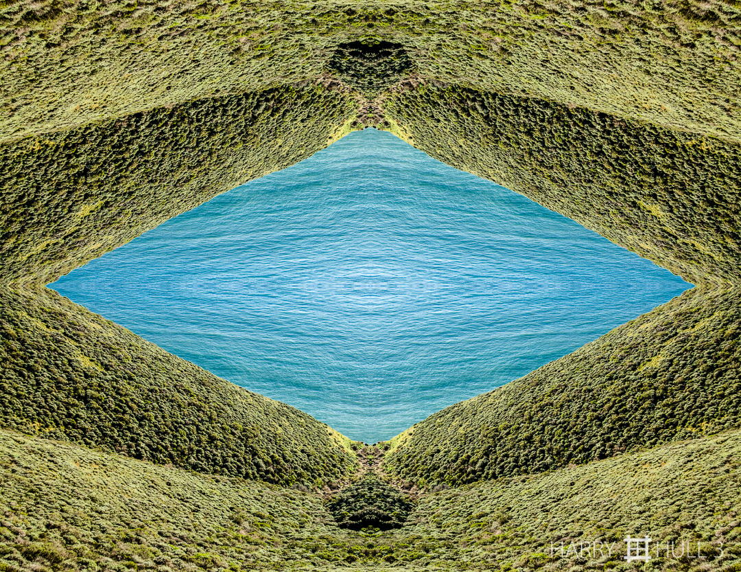 Sea view. Photo of outer Golden Gate beyond a ravine on the Marin Headlands near Kirby Cove, Golden Gate National Recreation Area, Marin County, California.