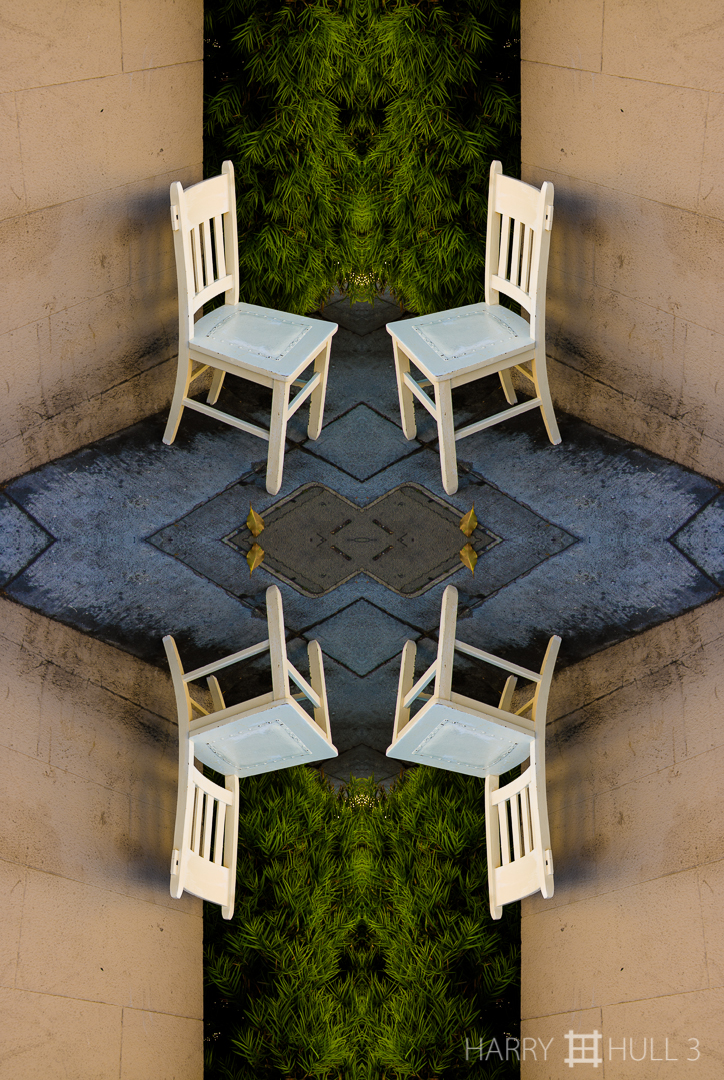 Sidewalk seating. Photo of chair next to the corner of a building, Russian Hill, San Francisco, California.