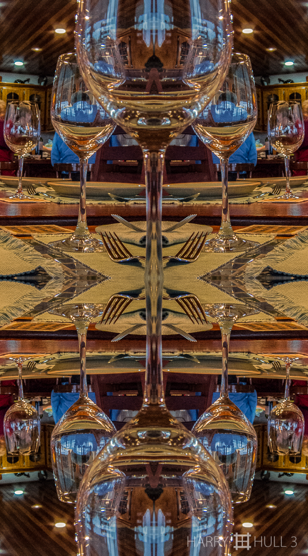 Tablescape with wineglasses. Photo of dining room table before dinner, private home near San Vito, Costa Rica.