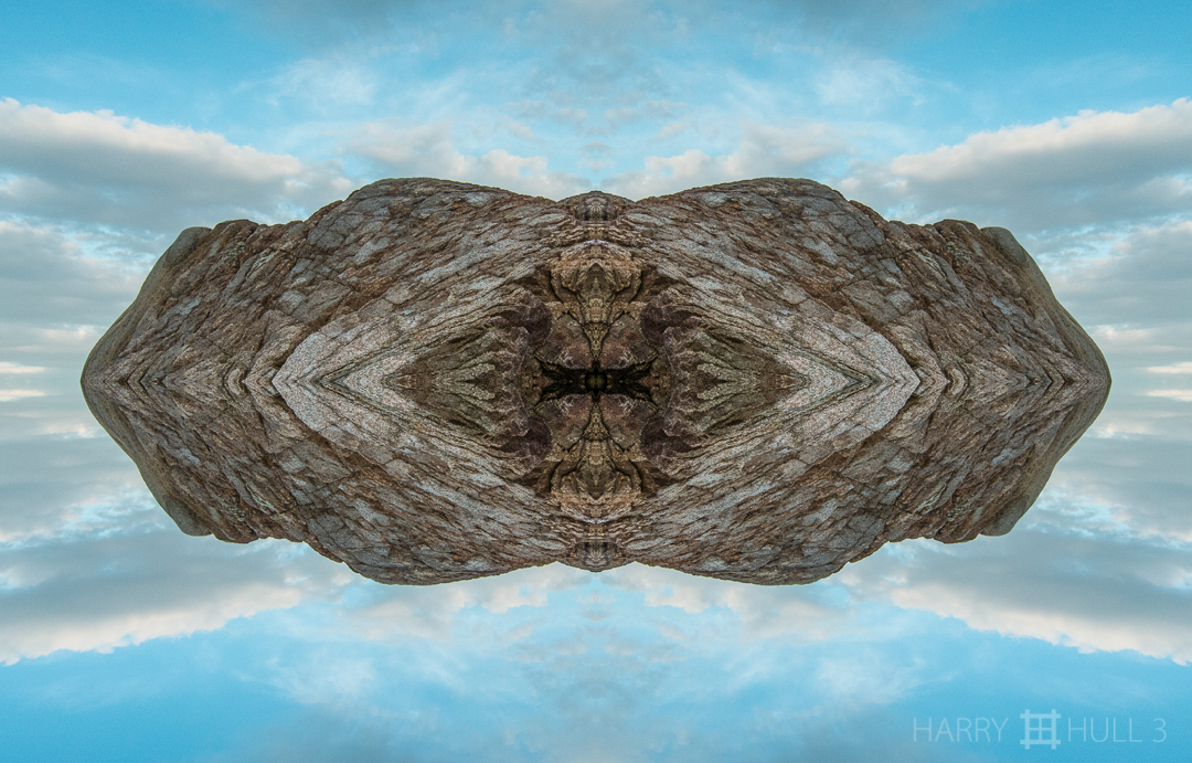 Boulder in the sky. Photo of granite rock at west end of Singing Beach, Manchester, Massachusetts.