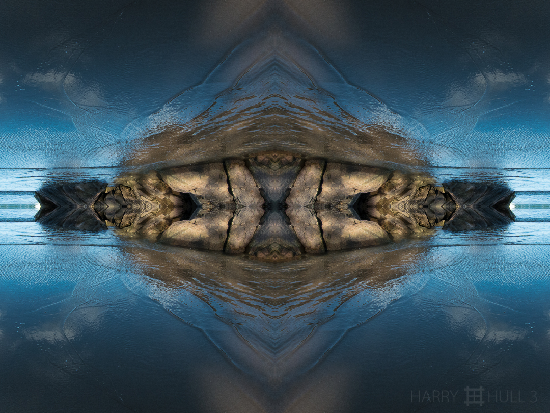 Beach fortress. Photo of granite rocks at low tide, west end of Singing Beach, Manchester, Massachusetts.