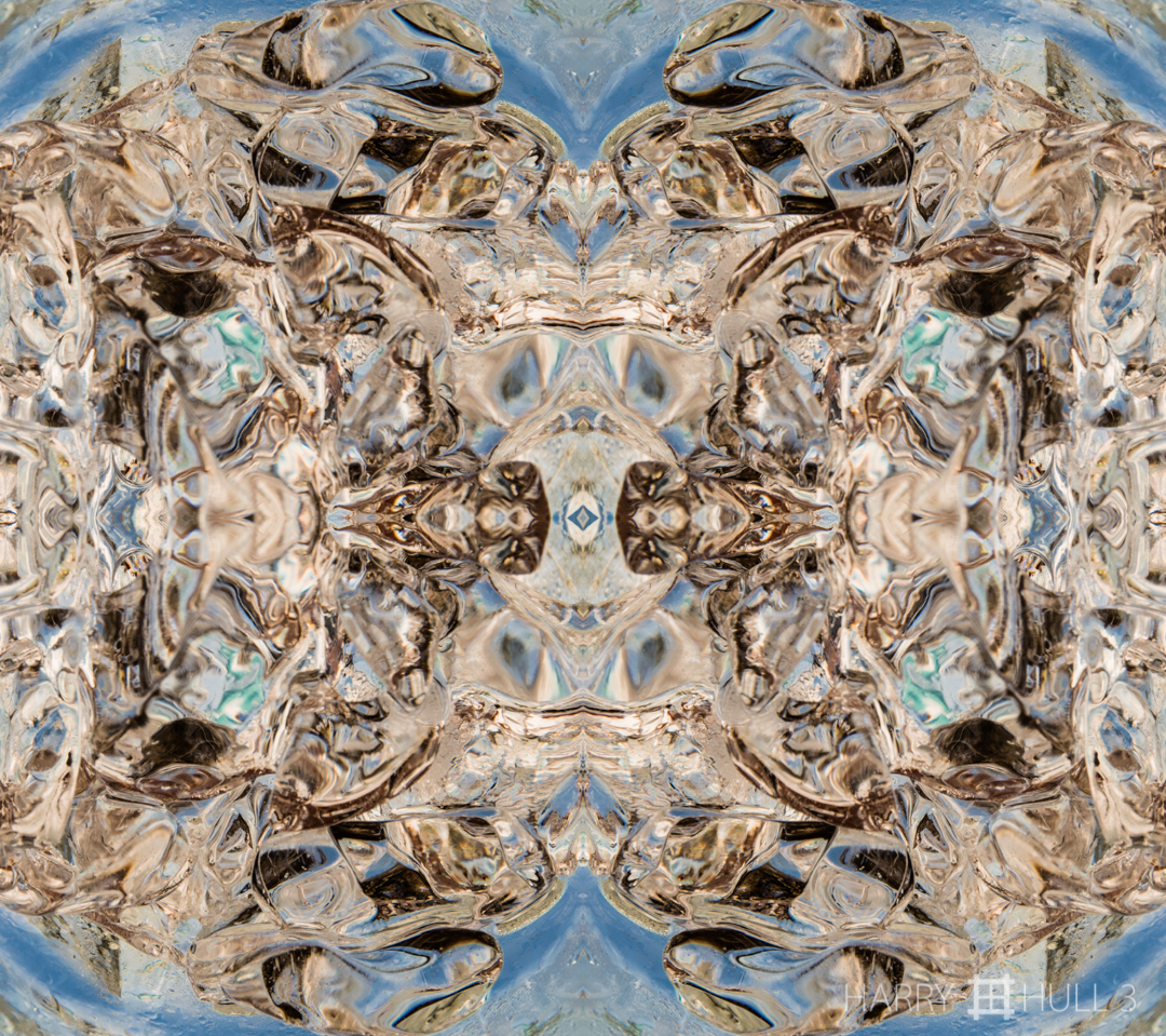 Ice cube arabesque. Photo of ice inside a glass at a beachside restaurant in Puerto Morelos, Mexican Caribbean.