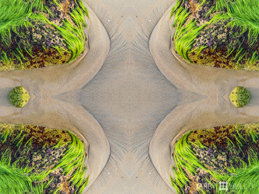 Beach rock tango: version 1. iPhone photo of granite rocks at Singing Beach, Manchester, Massachusetts.