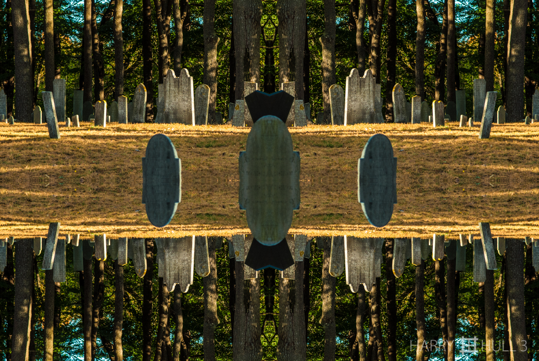 Hovering headstones. Photo of cemetery, Manchester, Massachusetts.