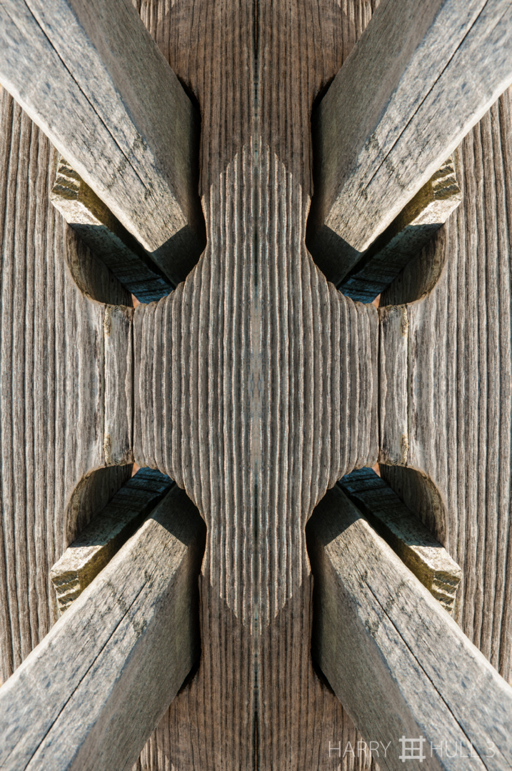 Fence post-modern. Photo of split-rail fence rails and post, Cape Cod, Massachusetts.