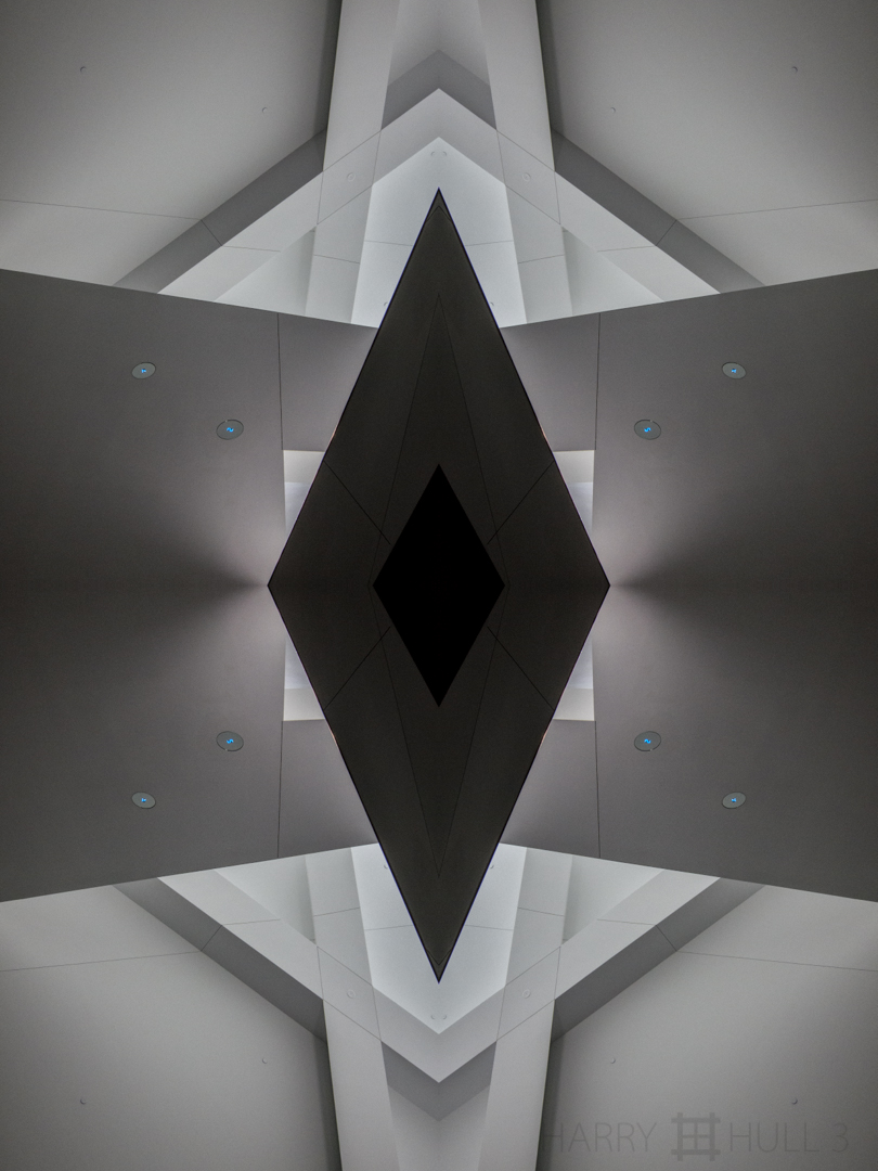 Dark shield. Photo of interior ceiling structure of the Denver Art Museum designed by Daniel Libeskind, Denver, Colorado.