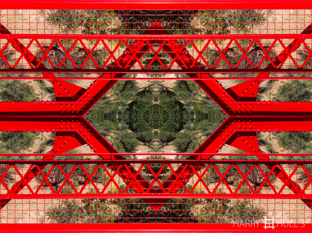 Bridge to nowhere. Photo of part of a truss bridge over an arroyo in the Santa Fe Botanical Garden, Santa Fe, New Mexico.