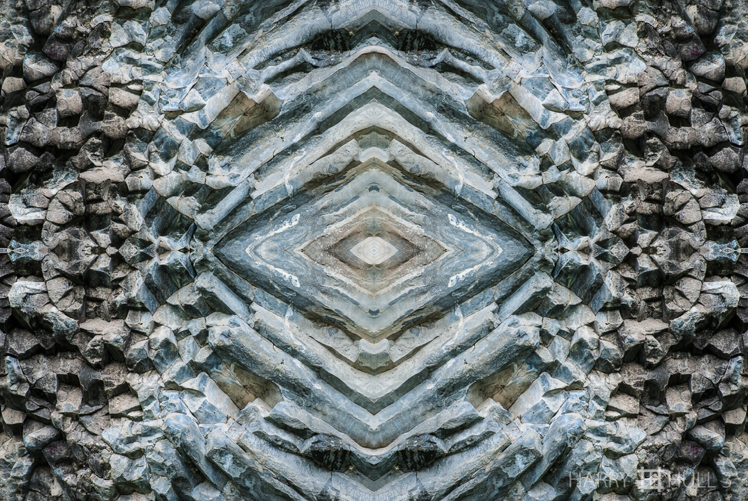 Eye of stone. Photo of basalt rock pattern in a road cut outside of Boquete, Panama.