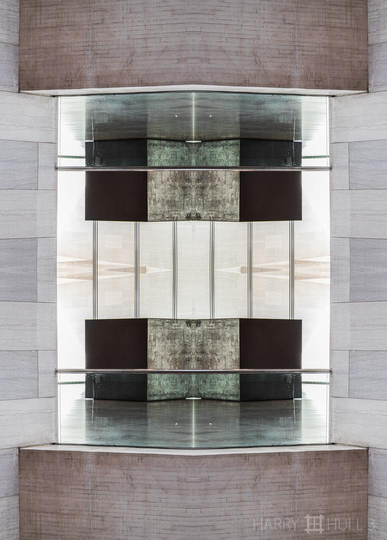 Opposed masses. Photo of mezzanine and cube sculpture, East Building, National Gallery of Art, Washington, DC.