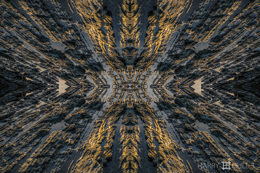 Rock convergence zone. Photo of rocky shore exposed at low tide, Playa Santa Teresa, Nicoya Peninsula, Costa Rica.