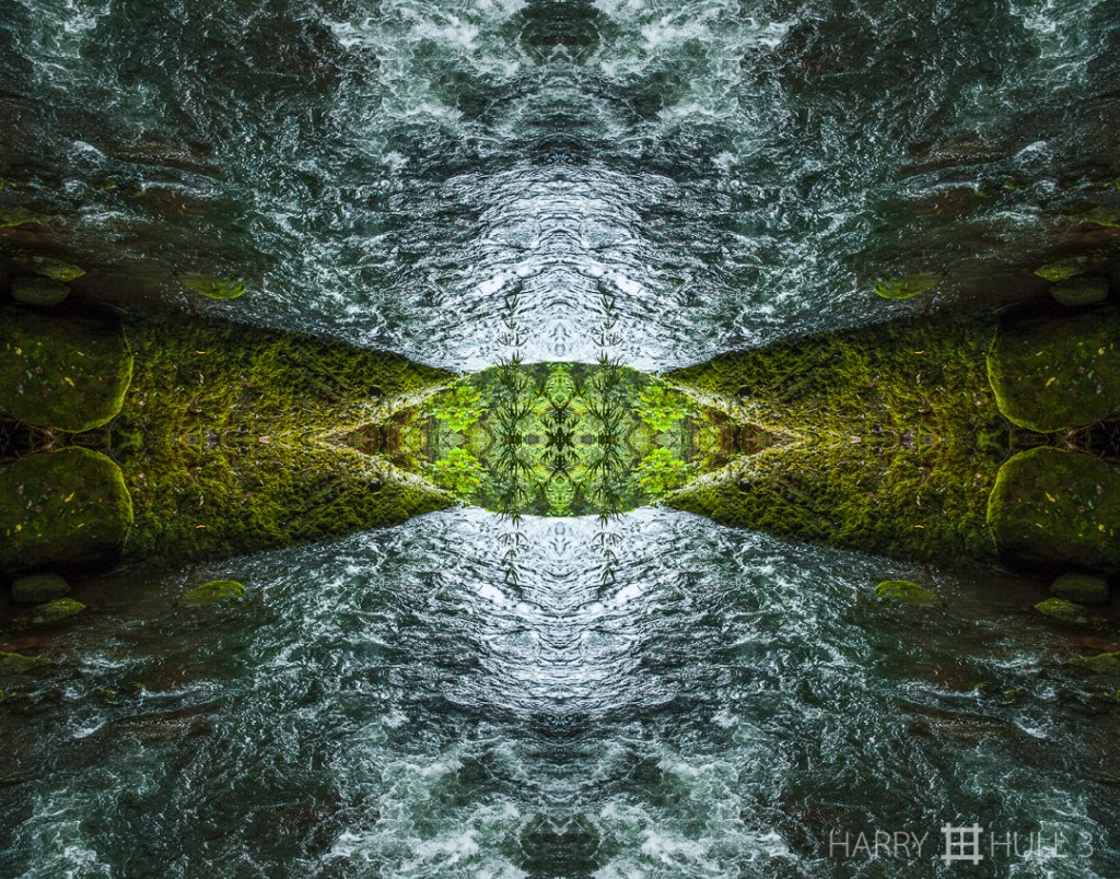 River exit. Photo taken downstream of the top edge of a waterfall on the la Paz River, la Paz Water Gardens Nature Park, Costa Rica.